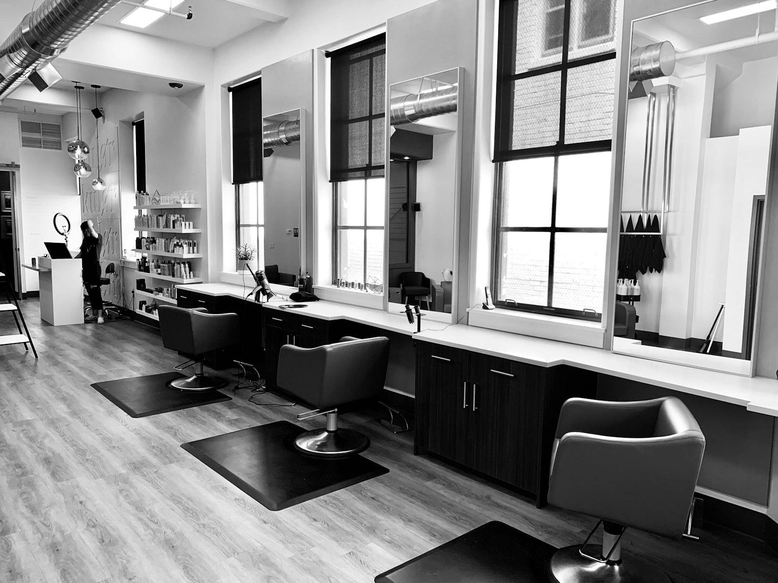 Bright hair salon with styling stations